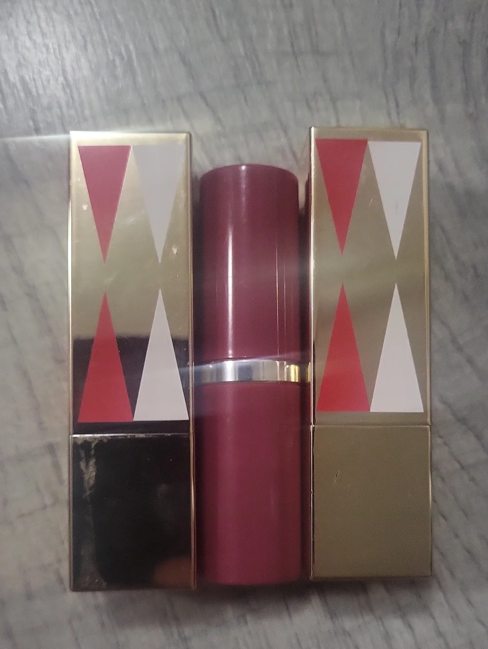 Three Lipsticks- Two Estee Lauder Pure Color Envy & One Clinique